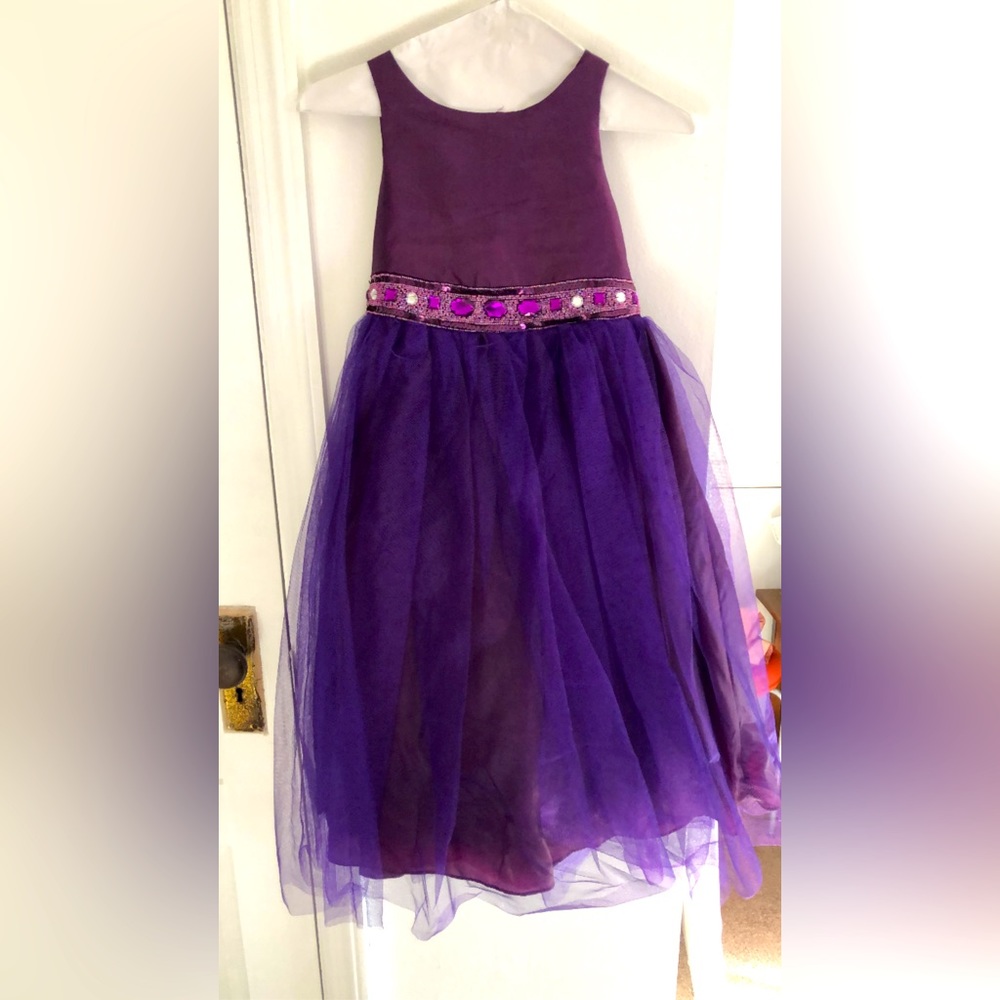 Beautiful purple flower girl dress w/beaded waistline. Size 8. Have size 4 also.